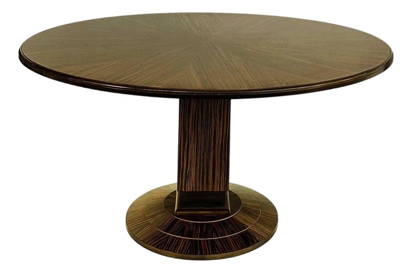 Round macassar ebony pedestal dining table with sunburst-matched top and stepped circular base