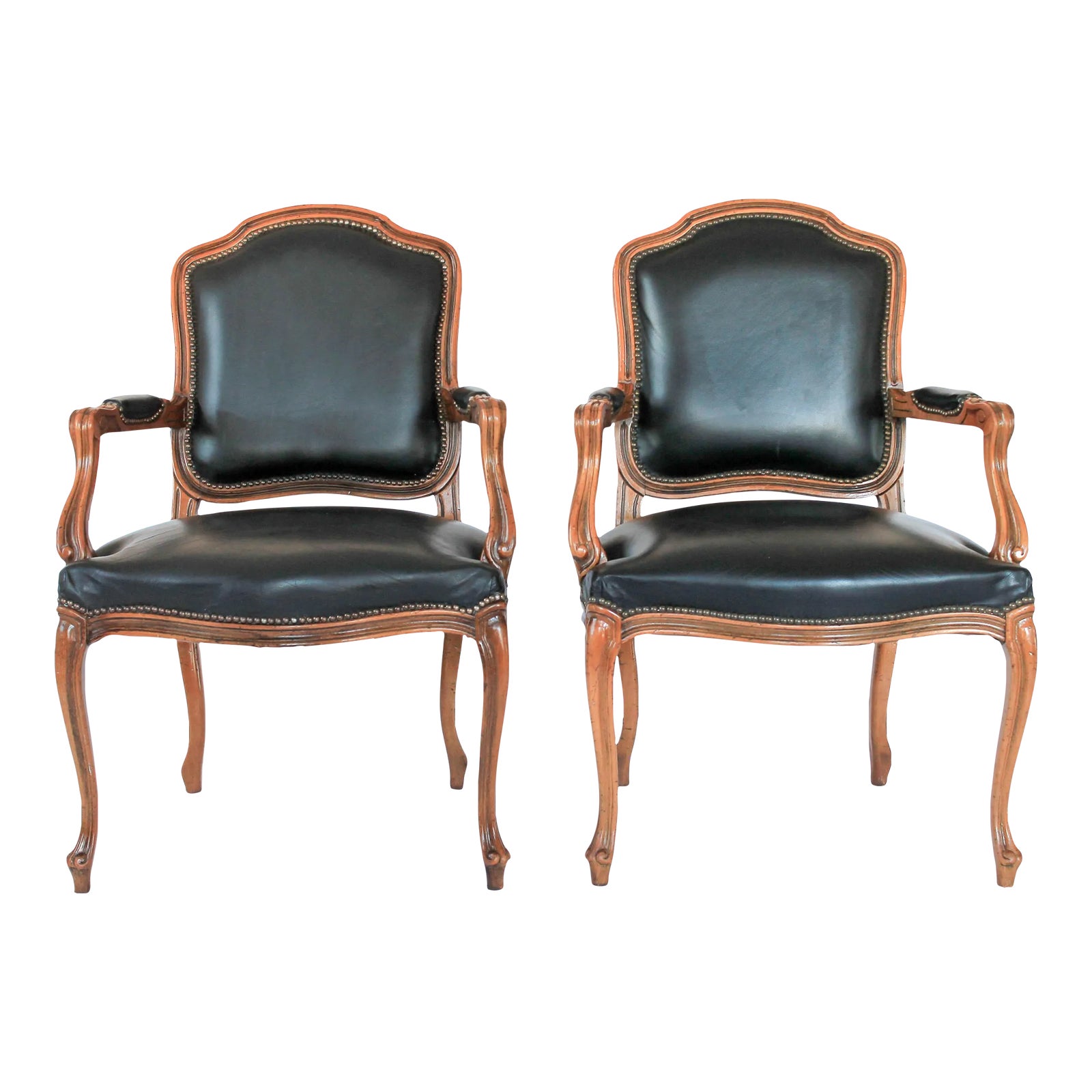 Pair of Chateau d'Ax Louis XV style black leather fauteuils