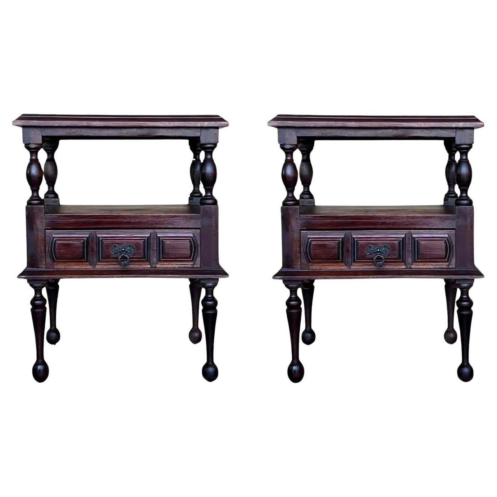 Pair of carved Spanish walnut nightstands